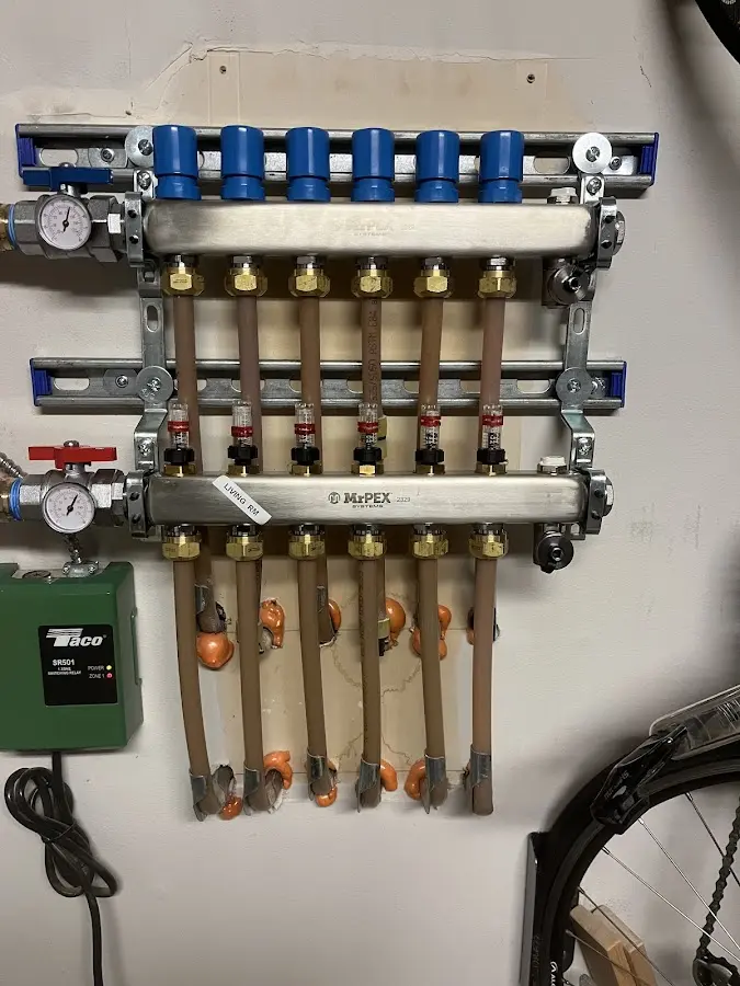 Plumber performing Water Heater Repair at a residential property in Maumee