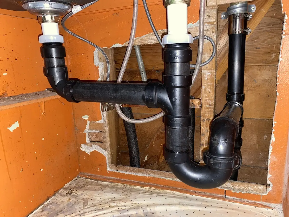 Professional Garbage Disposal Repair equipment and tools on the job in Maumee